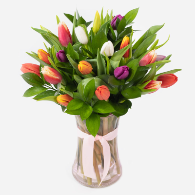 Spring Kisses - This glass vase filled with beautiful tulips is the epitome of spring and is the perfect way to share your love.