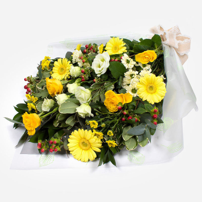 Funeral Flowers SYM-334 - Funeral Flowers in Cellophane. Yellow perfect bouquet to send for a funeral. *Fine Print: Every product is hand made and delivered by the local florist. Pictures shown are recent examples of an actual arrangement that was designed by talented florists! Please note that each individual florist cannot guarantee what the flower varieties or colours will be (unless specified on the product description), they will guarantee that your specific arrangement will be fresh and beautiful.