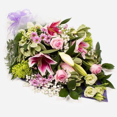 Funeral Flowers SYM-336 - Funeral Flowers in Cellophane Pink, Green & White. A beautiful and classic arrangement to send for a funeral. 

*Fine Print: Every product is hand made and delivered by the local florist. Pictures shown are recent examples of an actual arrangement that was designed by talented florists! Please note that each individual florist cannot guarantee what the flower varieties or colours will be (unless specified on the product description), they will guarantee that your specific arrangement will be fresh and beautiful.