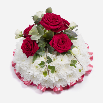 Posy SYM-344 - White Massed Base Posy with Red Rose Spray. Oasis 20cm / 8” Posy Pad. Ribbon edge. 

*Fine Print: Every product is hand made and delivered by the local florist. Pictures shown are recent examples of an actual arrangement that was designed by talented florists! Please note that each individual florist cannot guarantee what the flower varieties or colours will be (unless specified on the product description), they will guarantee that your specific arrangement will be fresh and beautiful.