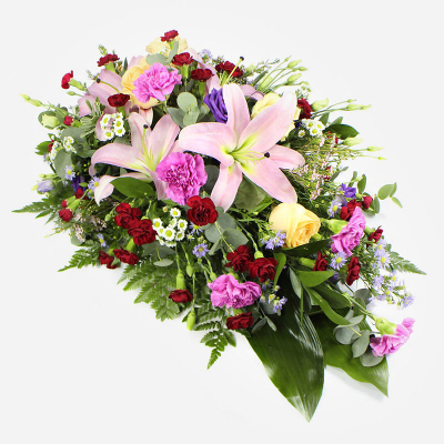 Single Ended Spray SYM-307 - Multi Coloured Single Ended Spray. Approx 75 cm long / 45cm width 

*Fine Print: Every product is hand made and delivered by the local florist. Pictures shown are recent examples of an actual arrangement that was designed by talented florists! Please note that each individual florist cannot guarantee what the flower varieties or colours will be (unless specified on the product description), they will guarantee that your specific arrangement will be fresh and beautiful.