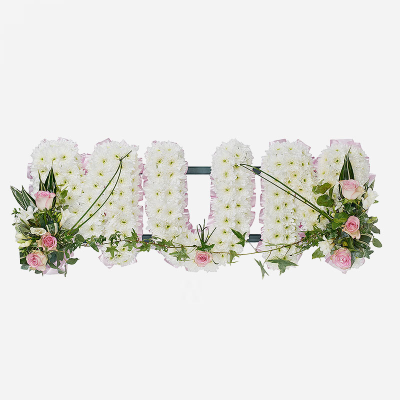 Letters SYM-340 - Example Style 1: MUM in Letters. 

*Fine Print: Every product is hand made and delivered by the local florist. Pictures shown are recent examples of an actual arrangement that was designed by talented florists! Please note that each individual florist cannot guarantee what the flower varieties or colours will be (unless specified on the product description), they will guarantee that your specific arrangement will be fresh and beautiful.