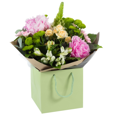Delicate Touch - Subtle and sweet is the aura of this handtied. Containing a mixed collection of seasonal flowers and peonies.